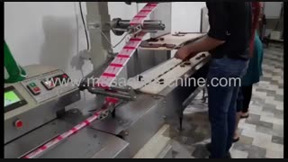 دستگاه بسته بندی لواشک مجلسی